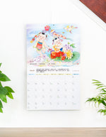 Minghui Wall Calendar 2025 - Songfu Baobao - Babies Spreading Blessings
